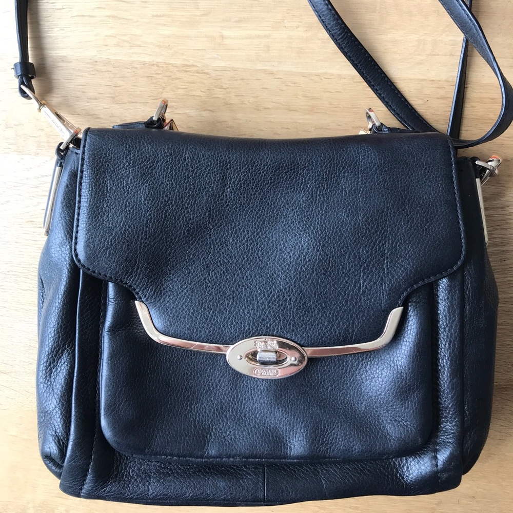 Black leather bag with gold hardware